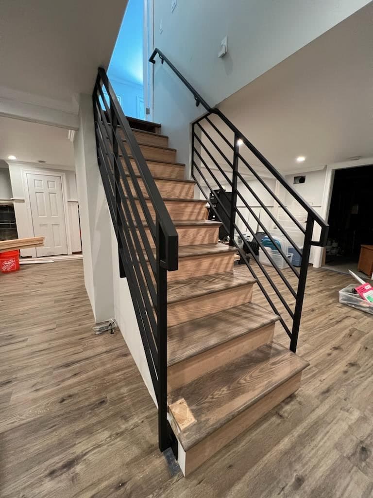 Modern horizontal metal railing for residential staircase in Fairfield County Connecticut