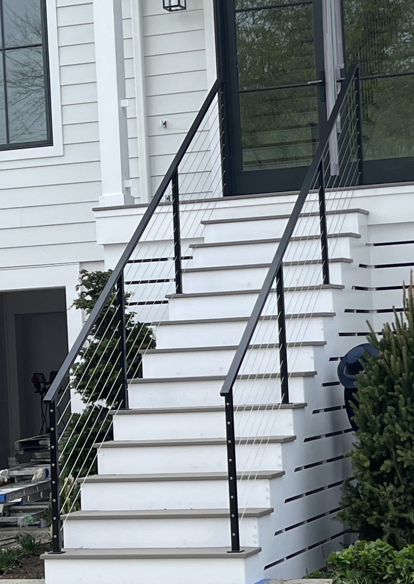 Exterior cable railing system installed on Connecticut deck by local metal fabricator